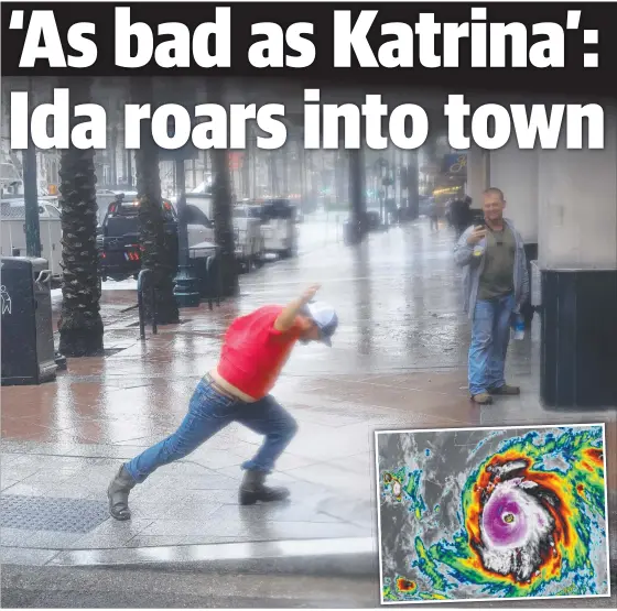  ?? Pictures: AFP ?? A man in New Orleans struggles to walk as Hurricane Ida (inset) unleashes howling winds and knocks out the city’s entire power grid.