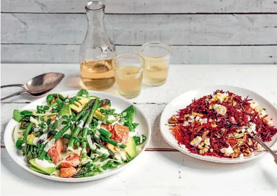  ??  ?? Salmon, asparagus and fennel salad is delicious on its own, but raw beetroot and carrot, feta and walnut salad is perfect with lamb.