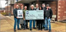  ?? SUBMITTED PHOTO — SAFE BERKS ?? Members of Heaven’s Thunder Band of Boyertown visited Safe Berks on Jan. 28 and delivered a check for nearly $4,200 to help renovate the Playground. From left, band members Randy Graber, Janelle and Guy Detweiler, Mark Malizzi, Keith Morris; Safe Berks...