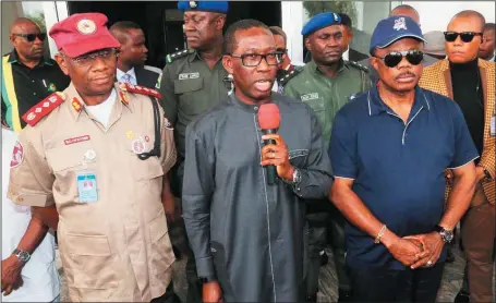  ??  ?? L-R: Corps Marshal, Federal Road Safety Corps (FRSC), Mr. Boboye Oyeyemi; Delta State Governor, Senator Ifeanyi Okowa; and his Anambra State counterpar­t, Chief Willie Obiano, during a courtesy visit on Governor Okowa in Government House...