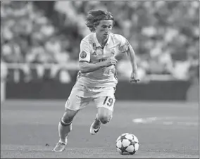  ??  ?? Luka Modric forceerde een transfer bij Tottenham Hotspur in 2012 om zich aan te sluiten bij Real Madrid. Modric baalt van de wijze waarop hij White Hart Lane verliet. (Foto: Nusport)