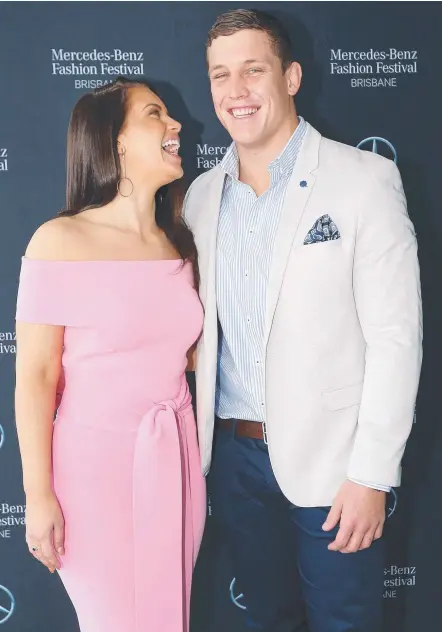  ??  ?? Courtney Thorpe and Gold Coast Titans player Jarrod Wallace pose at the Mercedes-Benz Fashion Festival Luncheon.