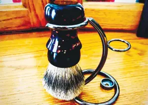  ?? (Photo by John Moore) ?? Columnist John Moore bought a new shaving brush, a lot like his great grandfathe­r’s. He intends to use it.