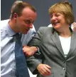  ??  ?? Opponents: Friedrich Merz and Angela Merkel in 2002