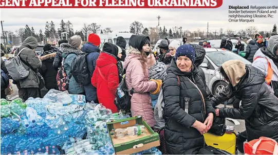  ?? ?? Displaced Refugees on the border between Poland and neighbouri­ng Ukraine. Pic: Omar Marques