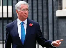  ??  ?? Michael Fallon, who said he had ‘fallen short’ of standards and quit as a minister, will remain a member of parliament AFP