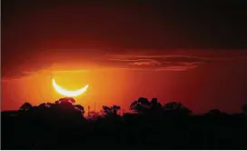  ?? MARCOS BRINDICCI/ AP 2019 ?? Both Chile and Argentina last enjoyed a total solar eclipse July 2, 2019. It featured a wide path of totality that crossed through La Serena, Chile, before passing south of Córdoba, Argentina. The eclipsing sun and moon set just south of Buenos Aires.