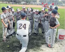  ?? SUBMITTED PHOTO ?? Adam Crowley, seen giving a pre-game speech to the Peterborou­gh Major Rookie AAA Tigers at the provincial championsh­ips in North Toronto, was named the 2018 Baseball Ontario Junior Coach of the Year.