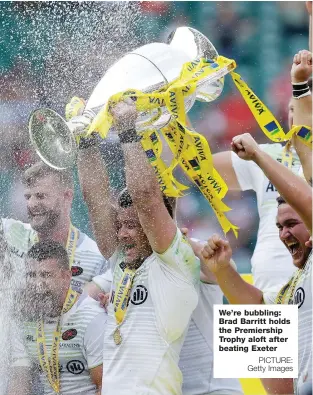  ?? PICTURE: Getty Images ?? We’re bubbling: Brad Barritt holds the Premiershi­p Trophy aloft after beating Exeter