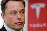  ?? — Reuters ?? Tesla Motors Inc Chief Executive Elon Musk pauses during a news conference in Tokyo.