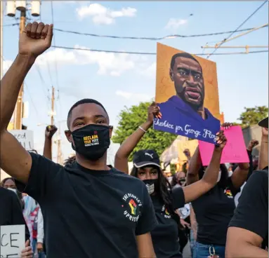  ?? Picture: Megan Varner ?? People march through the streets of Atlanta after the verdict was announced for Derek Chauvin