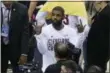  ?? RON SCHWANE — THE ASSOCIATED PRESS ?? Kyrie Irving celebrates after the Cavaliers defeated the Warriors in Game 4 of the NBA Finals on June 9.