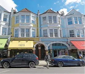  ?? ?? Pastel parade: colourful shopfronts on Fortis Green Road, also home to GibFit30 gym