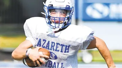  ?? PHOTOS BY APRIL GAMIZ/THE MORNING CALL ?? Nazareth’s Mason Kuehner runs the ball during practice on Friday. The Blue Eagles are the two-time defending District 11 6A champs.