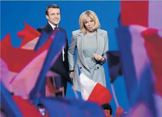  ?? Picture / AP ?? Emmanuel Macron says he will govern more effectivel­y if he is happy and that means having his wife, Brigitte Trogneux, at his side.