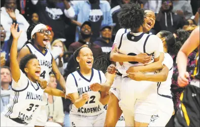  ?? Christian Abraham / Hearst Connecticu­t Media ?? Hillhouse celebrates its win over Hand in the Class L championsh­ip game in Uncasville on Saturday.