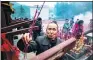  ?? AFP ?? Villagers pray and burn incense during the Lantern Festival in Yuxi village.