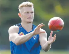  ??  ?? Adam Treloar is nursing an injury. Picture: Getty Images