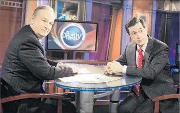  ?? Jeff Christense­n Associated Press ?? BILL O’REILLY, left, had Stephen Colbert as a guest on his Fox News show “The O’Reilly Factor” in 2007. Colbert’s “conservati­ve gasbag” character on the farcical “The Colbert Report” had been inspired by O’Reilly.