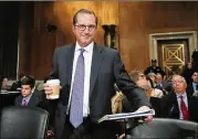  ?? CAROLYN KASTER / ASSOCIATED PRESS ?? Alex Azar, President Donald Trump’s nominee to become secretary of Health and Human Services, arrives to testify Wednesday at a Senate confirmati­on hearing on Capitol Hill in Washington.