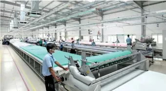  ??  ?? File picture of an apparel factory in Colombo. Garments : Sri Lanka's biggest export