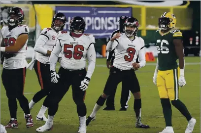  ?? PHOTOS BY MORRY GASH — THE ASSOCIATED PRESS ?? Tampa Bay Buccaneers kicker Ryan Succop (3) celebrates his 46-yard field goal against the Green Bay Packers during the second half of the NFC championsh­ip NFL football game in Green Bay, Wis., Sunday.