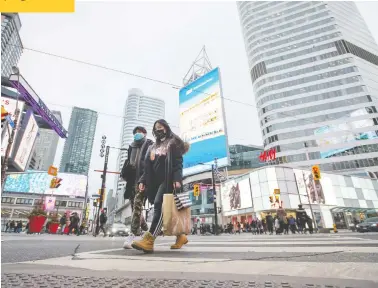  ?? PETER J THOMPSON / NATIONAL POST FILES ?? Even though the number of people infected with COVID-19 in Canadian cities is still relatively low, health experts are
advising people to stay indoors and away from groups of people as much as possible in an effort to stop its spread.