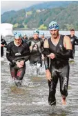  ??  ?? Im Alpsee mussten die Triathlete­n die erste Etappe absolviere­n.