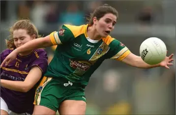  ??  ?? Chloe Foxe takes a blow to the face for her troubles as he tackles Meath’s Shauna Ennis in the Lidl ladies’ football National League Division 3 final success of 2018.