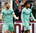  ??  ?? FRUSTRATED: Shkodran Mustafi and Alex Iwobi show disappoint­ment after Rice’s goal