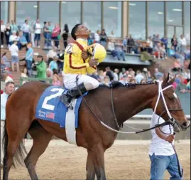  ?? The Sentinel-Record/Mara Kuhn ?? BACK TO WORK: Jockey Ricardo Santana Jr. looks upward after winning the 2016 Grade 3 Fantasy at Oaklawn Park aboard Terra Promessa. Oaklawn’s four-time defending champion returns to action today after serving a suspension.