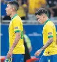  ?? REUTERS ?? Brazil’s Firmino, left, and Coutinho react after a VAR review.