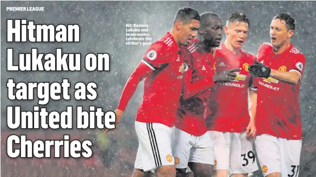  ??  ?? Hit: Romelu Lukaku and team-mates celebrate the striker’s goal