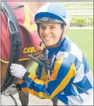  ?? Photo / Colin Thorsen ?? Winners are grinners . . . Te Awamutu jockey Bridget Grylls unsaddles the victorious Joseph Waldron trained Ujumpijump.