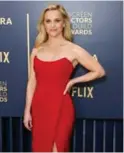  ?? ?? La actriz Reese Witherspoo­n, espectacul­ar de rojo.