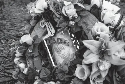  ?? Stephen Maturen / Getty Images ?? Memorials mark George Floyd Square on Thursday in Minneapoli­s as ex-officer Derek Chauvin’s murder trial continues.