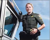  ?? Tyler Sizemore / Hearst Connecticu­t Media file photo ?? EnCon police officer Alexandra Blackwell on her boat at state Department of Energy and Environmen­tal Protection headquarte­rs in Old Lyme.