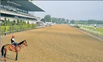  ?? AP ?? BETTER THAN NOTHING: The stands may be empty at Belmont on June 20, but at least the Belmont Stakes will be run, says Hall of Famers Bob Baffert and Mike Smith.