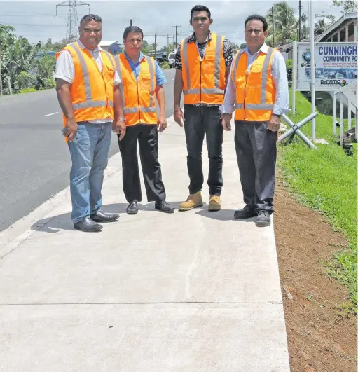  ?? Photo: Fiji Roads Authority ?? From left: Rehoboth Infrastruc­ture Ltd’s Sekaia Ragata, Fiji Roads Authority manager Project Controls Ripon Baral, Intermedia­te Engineer Anesh Sharan and acting general manager Capital Works Tarun Bhalla on the new footpath at Cunningham.