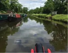  ??  ?? There are dozens of boats on the narrow canals and navigating past them can be tricky. Slowing down is the best way to make friends.