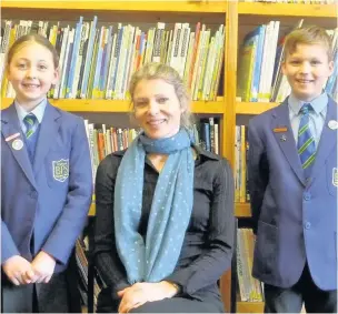  ??  ?? ●●Award winning children’s author Ruth Eastham with Brabyns pupils Annabel Aston and Alfie Higgins (Both Year 4)