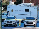  ?? ?? A Virginia State Police crime scene investigat­ion truck is on the scene of an overnight shooting in Virginia