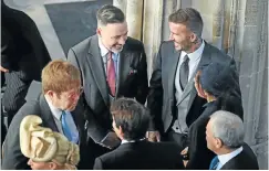  ?? Pictures: AFP ?? Tennis star Serena Williams wore a delightful fascinator. David and Victoria Beckham had time for a chat with British musician Elton John and husband David Furnish before the ceremony.