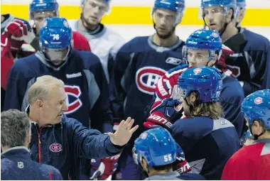  ?? ALLEN McINNIS/ THE GAZETTE ?? Members of the Montreal Canadiens listen as head coach Michel Therrien, left, explains new drills during team practice at the Bell Sports Complex in Brossard on Wednesday. The Habs host the Colorado Avalanche on Thursday.