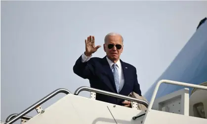  ?? Photograph: Jim Watson/AFP/Getty Images ?? Joe Biden boards Air Force One in Maryland on Sunday.
