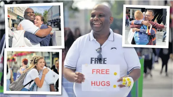  ?? RICHARD SWINGLER ?? Sri Ponnuswamy was giving away free hugs in Queen Street, Cardiff, yesterday