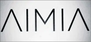  ?? CP PHOTO ?? Aimia Inc. has named Nathaniel Felsher as president and chief strategy officer. An AIMIA logo is shown at the company’s annual general meeting in Montreal in 2012.