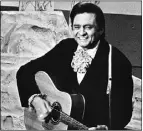  ?? Reuters, FILE ?? Johnny Cash performed on the stage
of Nashville’s Ryman Auditorium.
