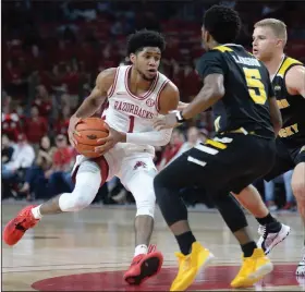  ?? (NWA Democrat-Gazette/Andy Shupe) ?? Arkansas guard Isaiah Joe (1) drives to the basket in the Razorbacks’ 66-60 victory over Northern Kentucky on Nov. 30. Joe announced he is going to enter the NBA Draft, but he is keeping open a possible return to Arkansas.