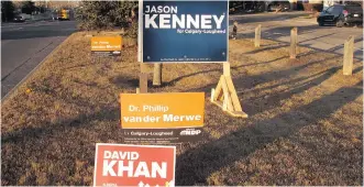  ?? BILL GRAVELAND/THE CANADIAN PRESS/FILES ?? Electronic vote tabulators were used in the Calgary-Lougheed byelection. A large number of results were out within five minutes of the polls closing and the majority in 20 minutes.